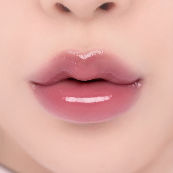 Блеск в виноградном оттенке Rom&nd Glasting Color Gloss #04 Grapy Way 704 фото