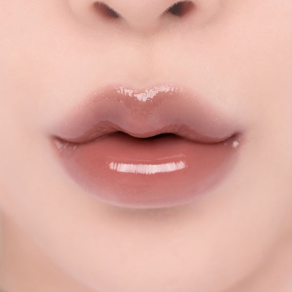 Блеск в естественно-коричневом оттенке Rom&nd Glasting Color Gloss #06 Deepen Moor 706 фото